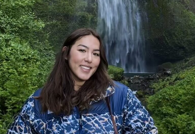 Photo of Daniela Suarez by a waterfall