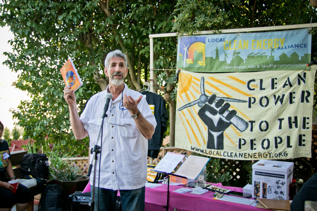 Al Weinrub speaks about the book Energy Democracy at the annual LCEA picnic.